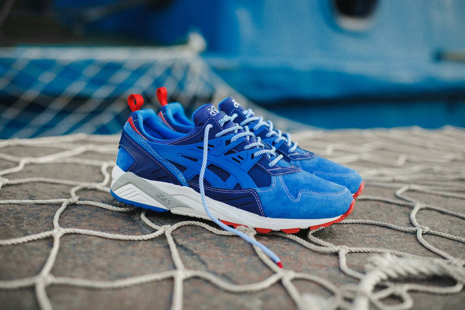 Pair of blue Asics running shoes